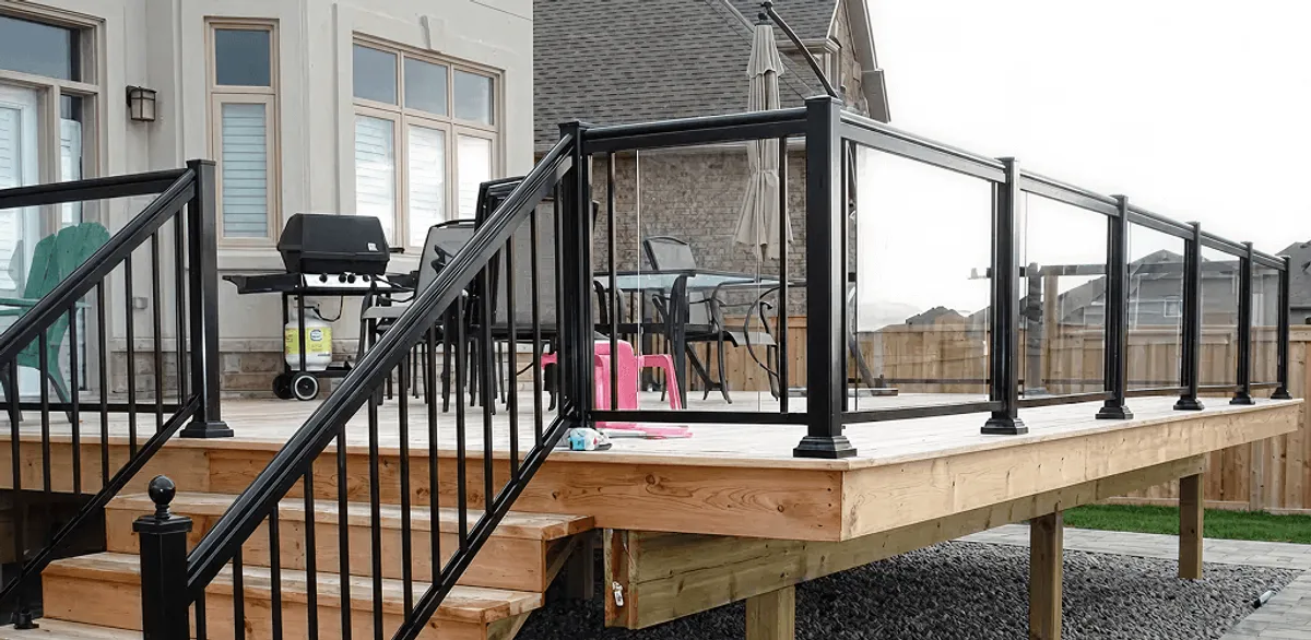 Handrail installation on a deck staircase for safety and code compliance in Ogden, UT